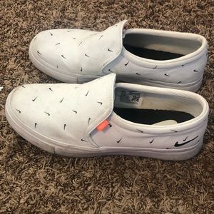 White Nike Women’s Court Royale AC slip on sneaker